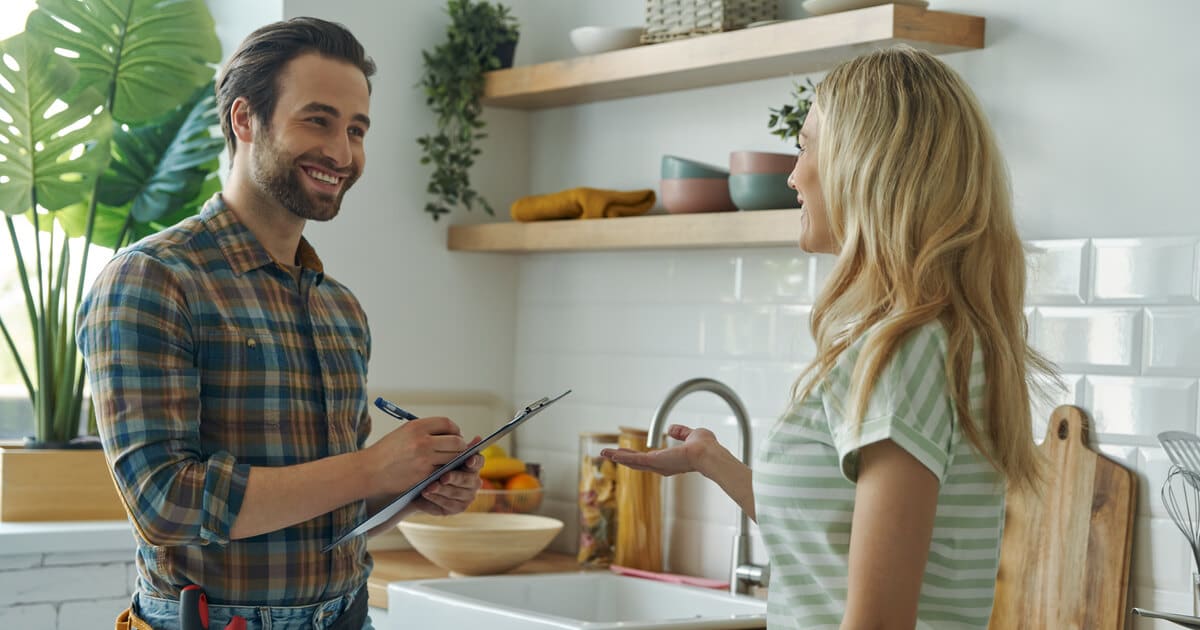 A plumber is offering guidance to a homeowner, answering the question, "How long does a well pump last?"
